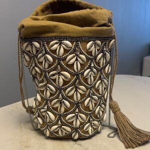 Shell-Embellished Drawstring Mini Bucket Bag in Mustard